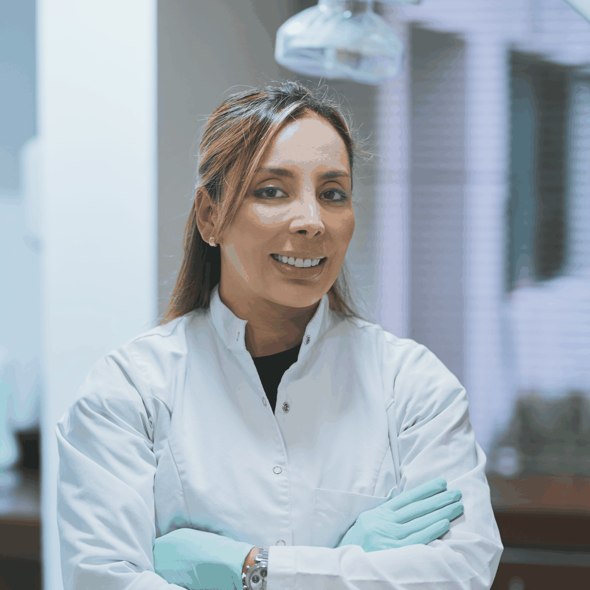 Rotating photos of dental patients and clinicians in practice